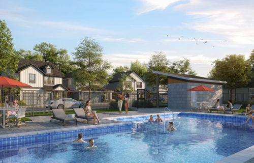 Beautiful pool with Arista Mckinney residents in the pool and lounging.